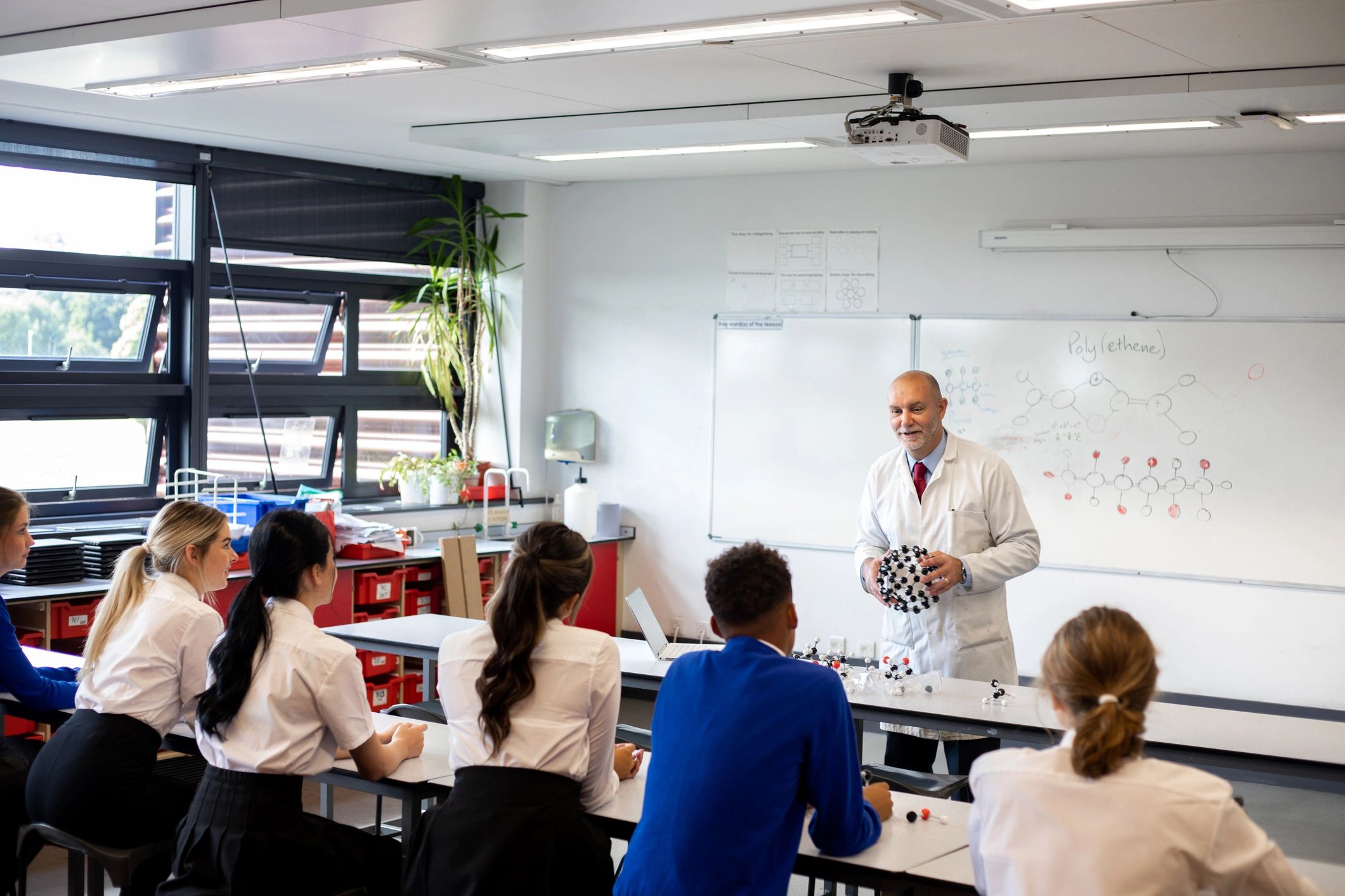 Teacher leading an education session in a classroom