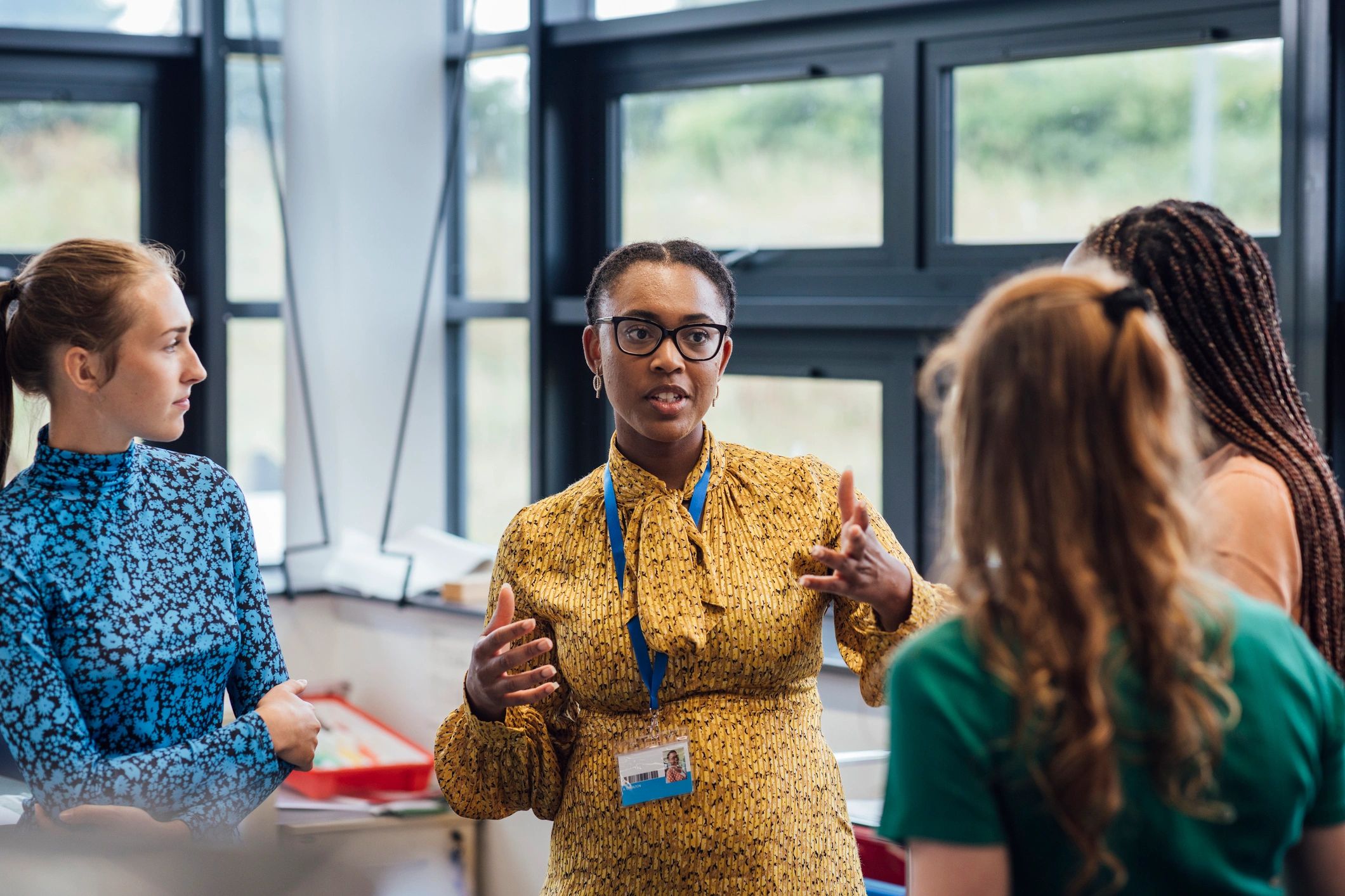 Teacher guiding students in discussion