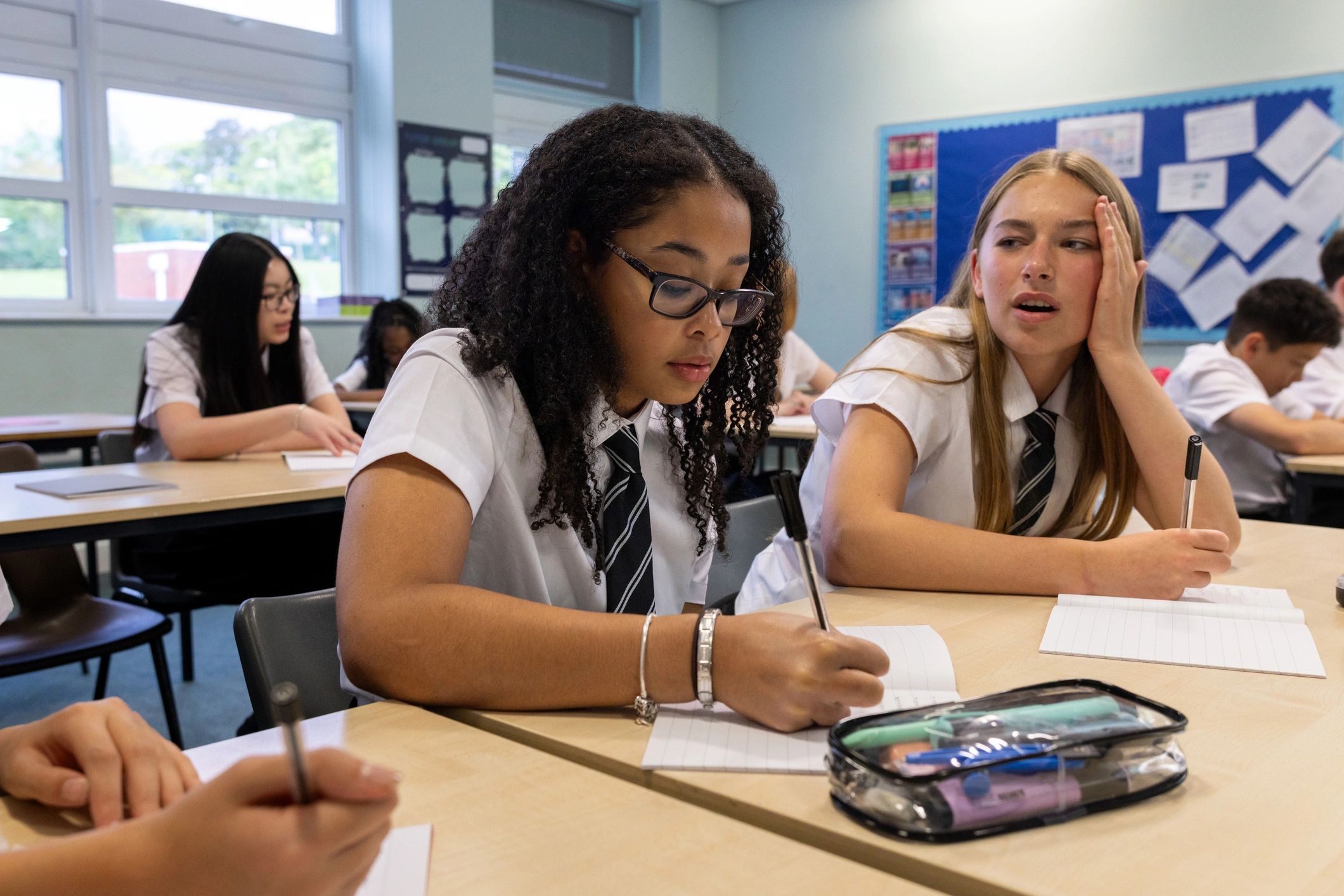 Students learning together in a classroom